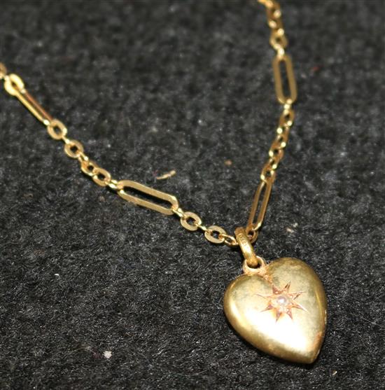 15ct gold pearl-set heart pendant on 18ct gold neck chain
